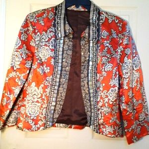 WD Platinum Jacket size 14. Colors burnt orange off white, & Brown